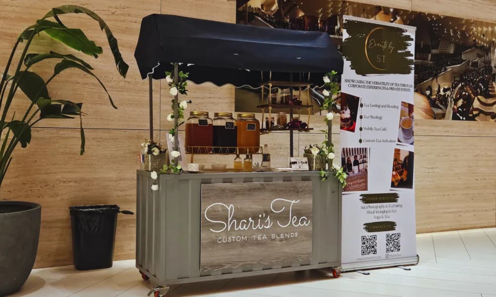 Events by ST branded mobile tea cafe cart set up at a corporate event
